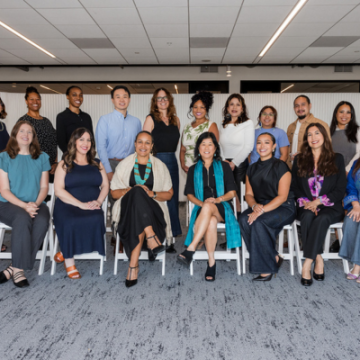 A group of leaders from across California convening in Oakland and posed together for a photo
