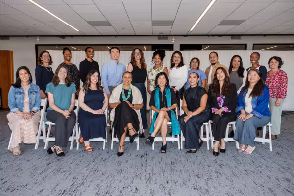 A group of leaders from across California convening in Oakland and posed together for a photo