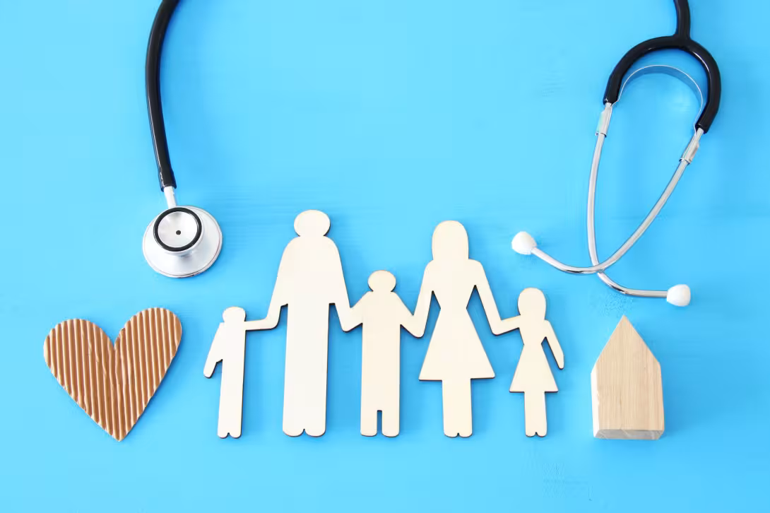paper cutout of a family holding hands