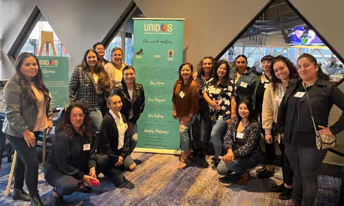 A group of women gathered for the Unidos’ ELLA-ES fellowship